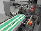 Used IWKA Model CPSR Automatic Horizontal Cartoner. Capable of speeds up to 250 cartons per minute. Has automatic bottle loader and dual blister feeders. Has 4