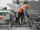Used IWKA Model CPSR Automatic Horizontal Cartoner. Capable of speeds up to 250 cartons per minute. Has automatic bottle loader and dual blister feeders. Has 4