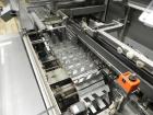 Used IWKA Model CPSR Automatic Horizontal Cartoner. Capable of speeds up to 250 cartons per minute. Has automatic bottle loader and dual blister feeders. Has 4