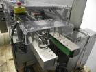 Used IWKA Model CPSR Automatic Horizontal Cartoner. Capable of speeds up to 250 cartons per minute. Has automatic bottle loader and dual blister feeders. Has 4