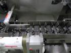 Used Uhlmann Model C2205 Automatic Bottle Cartoner. Capable of speeds up to 250 cartons per minute. Is a continuous motion cartoner. Has a 5