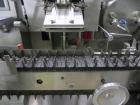 Used Uhlmann Model C2205 Automatic Bottle Cartoner. Capable of speeds up to 250 cartons per minute. Is a continuous motion cartoner. Has a 5
