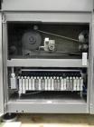 Used Uhlmann Model C2205 Automatic Bottle Cartoner. Capable of speeds up to 250 cartons per minute. Is a continuous motion cartoner. Has a 5