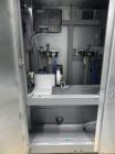 Used Uhlmann Model C2205 Automatic Bottle Cartoner. Capable of speeds up to 250 cartons per minute. Is a continuous motion cartoner. Has a 5
