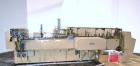 Used Zanasi Automatic Horizontal Continuous Motion Cartoner, Model KA, S/N 54127. This is a standard cartoner which was last running 5th panel tuck cartons, last running tubes and includes infeed sec...