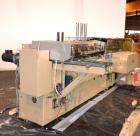 Used Zanasi Automatic Horizontal Continuous Motion Cartoner, Model KA, S/N 54127. This is a standard cartoner which was last running 5th panel tuck cartons, last running tubes and includes infeed sec...