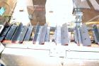 Used Zanasi Automatic Horizontal Continuous Motion Cartoner, Model KA, S/N 54127. This is a standard cartoner which was last running 5th panel tuck cartons, last running tubes and includes infeed sec...