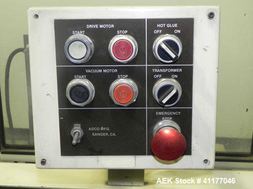 Used Adco Semi Automatic Horizontal Cartoner, Model 15DEC. Capable of speeds up to 60 cpm. Has 14" centers for a carton size range: length 1" to 12", width up to 3", and depth 5" to 12". Has Nordson ...