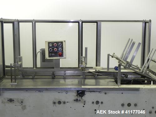 Used Adco Semi Automatic Horizontal Cartoner, Model 15DEC. Capable of speeds up to 60 cpm. Has 14" centers for a carton size range: length 1" to 12", width up to 3", and depth 5" to 12". Has Nordson ...