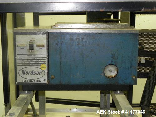 Used Adco Semi Automatic Horizontal Cartoner, Model 15DEC. Capable of speeds up to 60 cpm. Has 14" centers for a carton size range: length 1" to 12", width up to 3", and depth 5" to 12". Has Nordson ...
