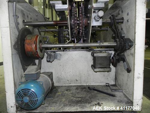 Used Adco Semi Automatic Horizontal Cartoner, Model 15DEC. Capable of speeds up to 60 cpm. Has 14" centers for a carton size range: length 1" to 12", width up to 3", and depth 5" to 12". Has Nordson ...