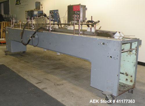 Used ADCO Semi Automatic Horizontal Carton End Sealer, Model 15DEC (similar to 15 CHL). Capable of speeds up to 30 CPM. Has 20" centers for carton size range: length 2" to 15", width 5/8" to 3", dept...