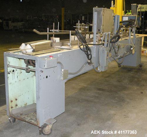 Used ADCO Semi Automatic Horizontal Carton End Sealer, Model 15DEC (similar to 15 CHL). Capable of speeds up to 30 CPM. Has 20" centers for carton size range: length 2" to 15", width 5/8" to 3", dept...