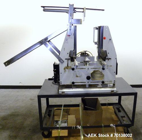 Used Econocorp Twinseal Carton Sealer, Model 4806. Capable of speeds up to 30 cartons per minute (1800 per hour). Has a carton size range: length 3/4" to 12" or 19mm to 305mm, width 3/4" to 4" or 19m...