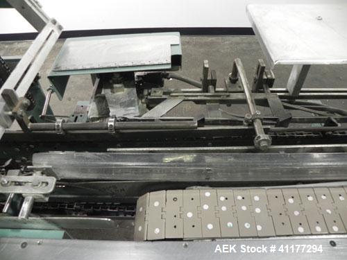 Used Langen Model B1 Semi-Automatic Horizontal Cartoner. Capable of speeds up to 120 cartons per minute. Has 9" centers for a carton size range: (length) 1-3/4" to 6-1/2", (width) 1/2" to 3", (depth)...