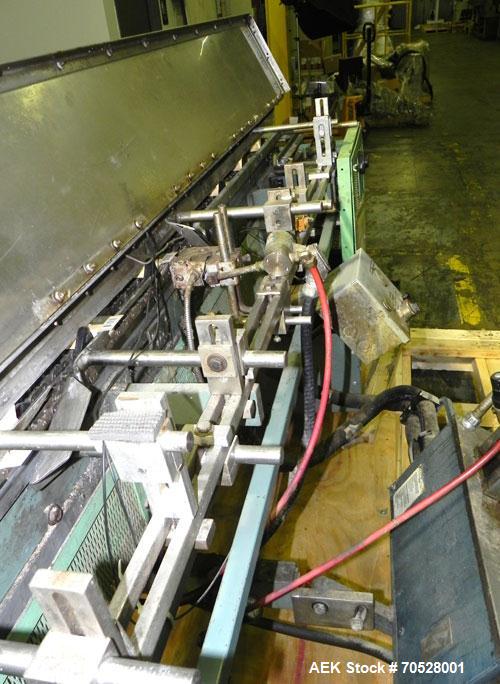 Used Langen Horizontal Cartoner, Model B1. Capable of speeds up to 120 cartons per minute. Has 9" centers for a carton size range: length 1-3/4" to 6-1/2", width 1/2" to 3", depth 3.75" to 14". Has r...