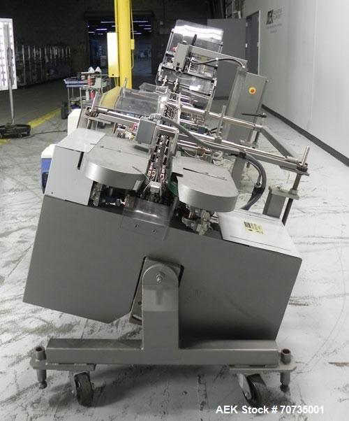 Used Langen Model B1 Semi-Automatic Horizontal Cartoner capable of speeds up to 120 cartons per minute. Has 9" centers with 3 chain carrier (can be converted to a 4 chain carrier) for a carton size r...