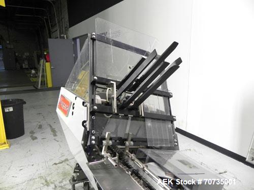 Used Langen Model B1 Semi-Automatic Horizontal Cartoner capable of speeds up to 120 cartons per minute. Has 9" centers with 3 chain carrier (can be converted to a 4 chain carrier) for a carton size r...