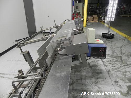 Used Langen Model B1 Semi-Automatic Horizontal Cartoner capable of speeds up to 120 cartons per minute. Has 9" centers with 3 chain carrier (can be converted to a 4 chain carrier) for a carton size r...