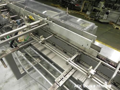 Used Langen Model B1 Semi-Automatic Horizontal Cartoner capable of speeds up to 120 cartons per minute. Has 9" centers with 3 chain carrier (can be converted to a 4 chain carrier) for a carton size r...
