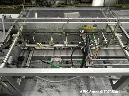 Used Langen Model B1 Semi-Automatic Horizontal Cartoner capable of speeds up to 120 cartons per minute. Has 9" centers with 3 chain carrier (can be converted to a 4 chain carrier) for a carton size r...