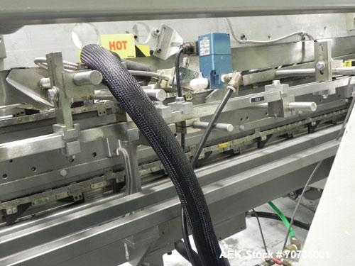 Used Langen Model B1 Semi-Automatic Horizontal Cartoner capable of speeds up to 120 cartons per minute. Has 9" centers with 3 chain carrier (can be converted to a 4 chain carrier) for a carton size r...