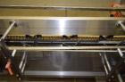 Used ADCO 15dz60 Horizontal Cartoner. Capable of speeds up to 60 cartons per minute. Has 12
