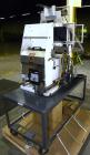 Used Econocorp Twinseal Carton Sealer, Model 4806. Capable of speeds up to 30 cartons per minute (1800 per hour). Has a carton size range: length 3/4