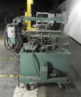Used Langen Model B1 Semi-Automatic Horizontal Cartoner. Capable of speeds up to 120 cartons per minute. Has 9
