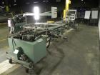 Used Langen Model B1 Semi-Automatic Horizontal Cartoner. Capable of speeds up to 120 cartons per minute. Has 9