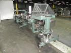 Used Langen Model B1 Semi-Automatic Horizontal Cartoner. Capable of speeds up to 120 cartons per minute. Has 9