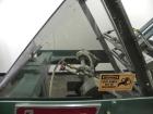 Used Langen Model B1 Semi-Automatic Horizontal Cartoner. Capable of speeds up to 120 cartons per minute. Has 9