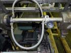 Used Langen Horizontal Cartoner, Model B1. Capable of speeds up to 120 cartons per minute. Has 9