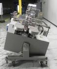 Used Langen Model B1 Semi-Automatic Horizontal Cartoner capable of speeds up to 120 cartons per minute. Has 9