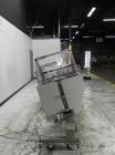 Used Langen Model B1 Semi-Automatic Horizontal Cartoner capable of speeds up to 120 cartons per minute. Has 9