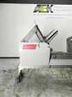 Used Langen Model B1 Semi-Automatic Horizontal Cartoner capable of speeds up to 120 cartons per minute. Has 9