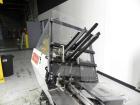 Used Langen Model B1 Semi-Automatic Horizontal Cartoner capable of speeds up to 120 cartons per minute. Has 9