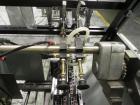 Used Langen Model B1 Semi-Automatic Horizontal Cartoner capable of speeds up to 120 cartons per minute. Has 9