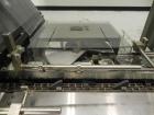 Used Langen Model B1 Semi-Automatic Horizontal Cartoner capable of speeds up to 120 cartons per minute. Has 9