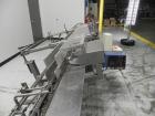 Used Langen Model B1 Semi-Automatic Horizontal Cartoner capable of speeds up to 120 cartons per minute. Has 9