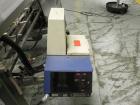 Used Langen Model B1 Semi-Automatic Horizontal Cartoner capable of speeds up to 120 cartons per minute. Has 9