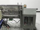 Used Langen Model B1 Semi-Automatic Horizontal Cartoner capable of speeds up to 120 cartons per minute. Has 9