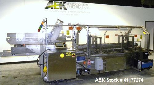 Used Adco Automatic Wraparound Carton Sleever, Model 12WA-125-33. Capable of speeds up to 125 cpm. Fully automatic multipack system for packaging beverage bottles, cans, cups, tubs, trays up to 125 s...