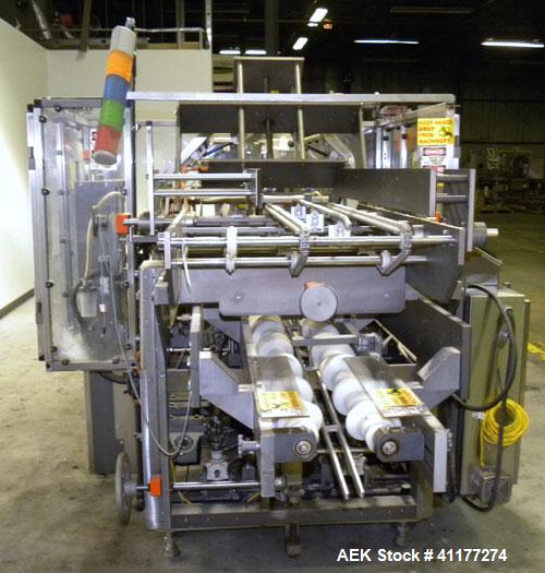 Used Adco Automatic Wraparound Carton Sleever, Model 12WA-125-33. Capable of speeds up to 125 cpm. Fully automatic multipack system for packaging beverage bottles, cans, cups, tubs, trays up to 125 s...