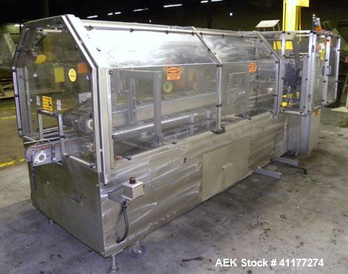 Used Adco Automatic Wraparound Carton Sleever, Model 12WA-125-33. Capable of speeds up to 125 cpm. Fully automatic multipack system for packaging beverage bottles, cans, cups, tubs, trays up to 125 s...