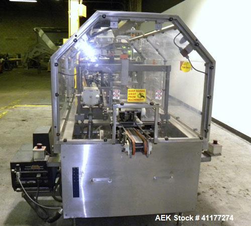 Used Adco Automatic Wraparound Carton Sleever, Model 12WA-125-33. Capable of speeds up to 125 cpm. Fully automatic multipack system for packaging beverage bottles, cans, cups, tubs, trays up to 125 s...