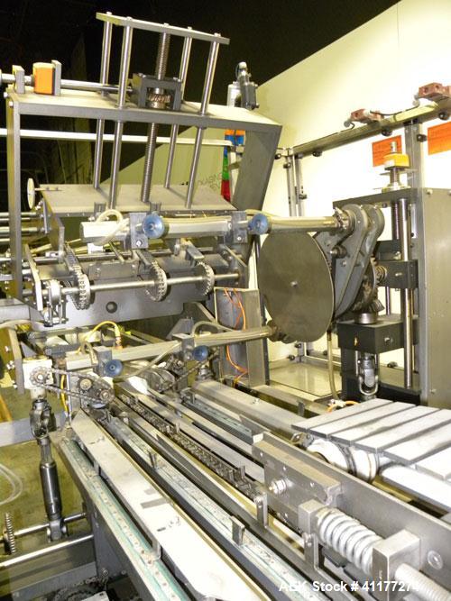 Used Adco Automatic Wraparound Carton Sleever, Model 12WA-125-33. Capable of speeds up to 125 cpm. Fully automatic multipack system for packaging beverage bottles, cans, cups, tubs, trays up to 125 s...