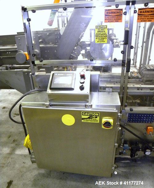 Used Adco Automatic Wraparound Carton Sleever, Model 12WA-125-33. Capable of speeds up to 125 cpm. Fully automatic multipack system for packaging beverage bottles, cans, cups, tubs, trays up to 125 s...