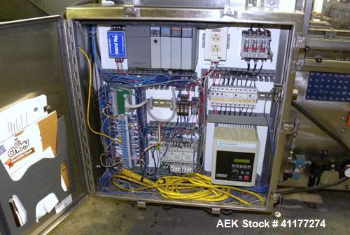 Used Adco Automatic Wraparound Carton Sleever, Model 12WA-125-33. Capable of speeds up to 125 cpm. Fully automatic multipack system for packaging beverage bottles, cans, cups, tubs, trays up to 125 s...