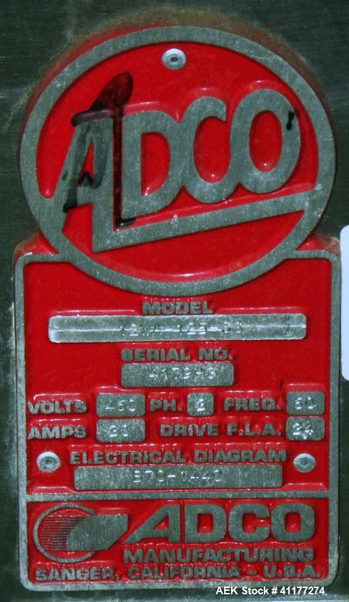 Used Adco Automatic Wraparound Carton Sleever, Model 12WA-125-33. Capable of speeds up to 125 cpm. Fully automatic multipack system for packaging beverage bottles, cans, cups, tubs, trays up to 125 s...